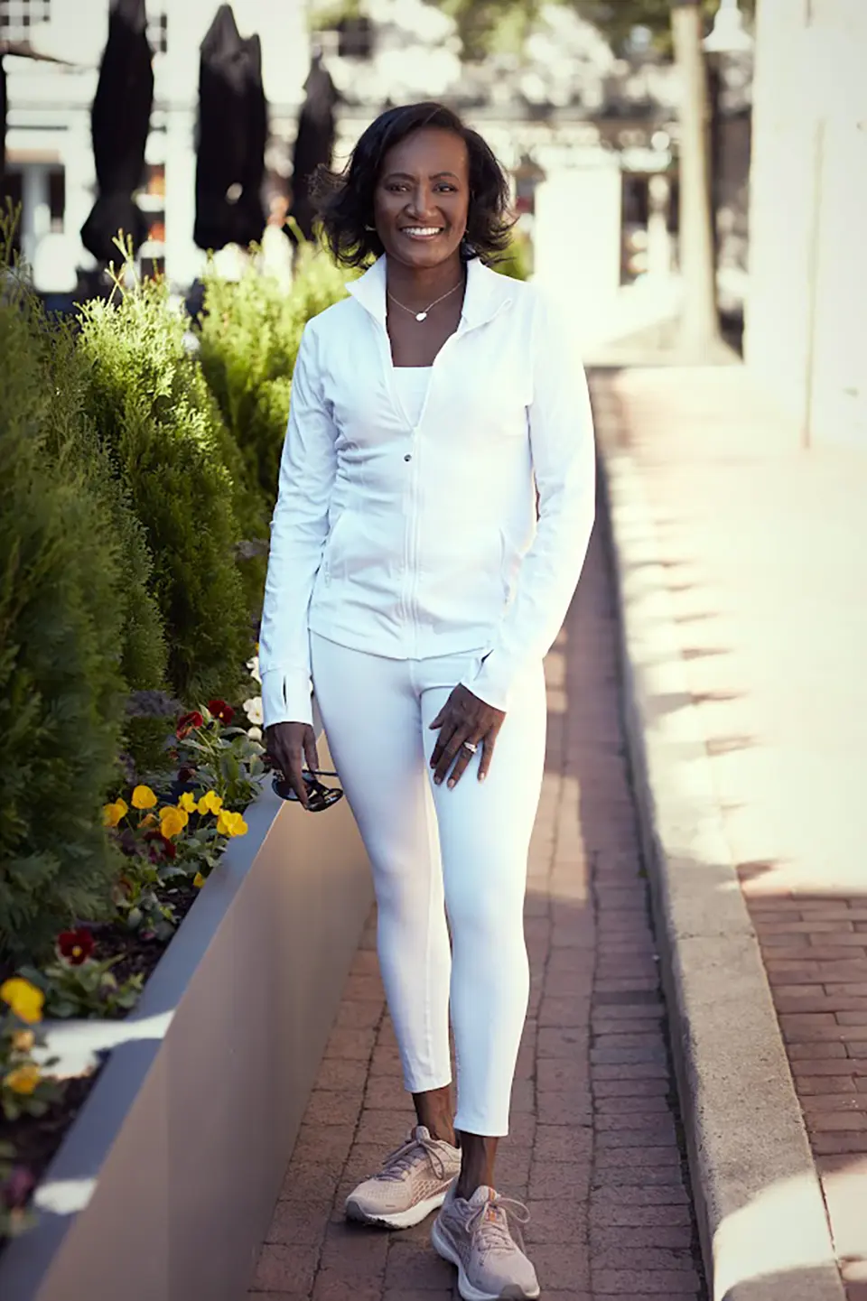 Fran Dean-Bishop in light-colored jogging attire